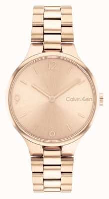 Calvin Klein Reloj de pulsera de acero inoxidable con esfera de rayos de sol de oro rosa. 25200131
