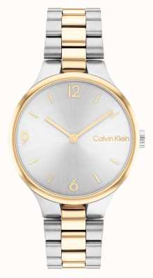 Calvin Klein Reloj de dos tonos de oro y plata, esfera plateada con rayos de sol. 25200132