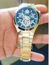 Customer picture of Bulova Reloj automático de hombre chapado pvd oro. 98A178